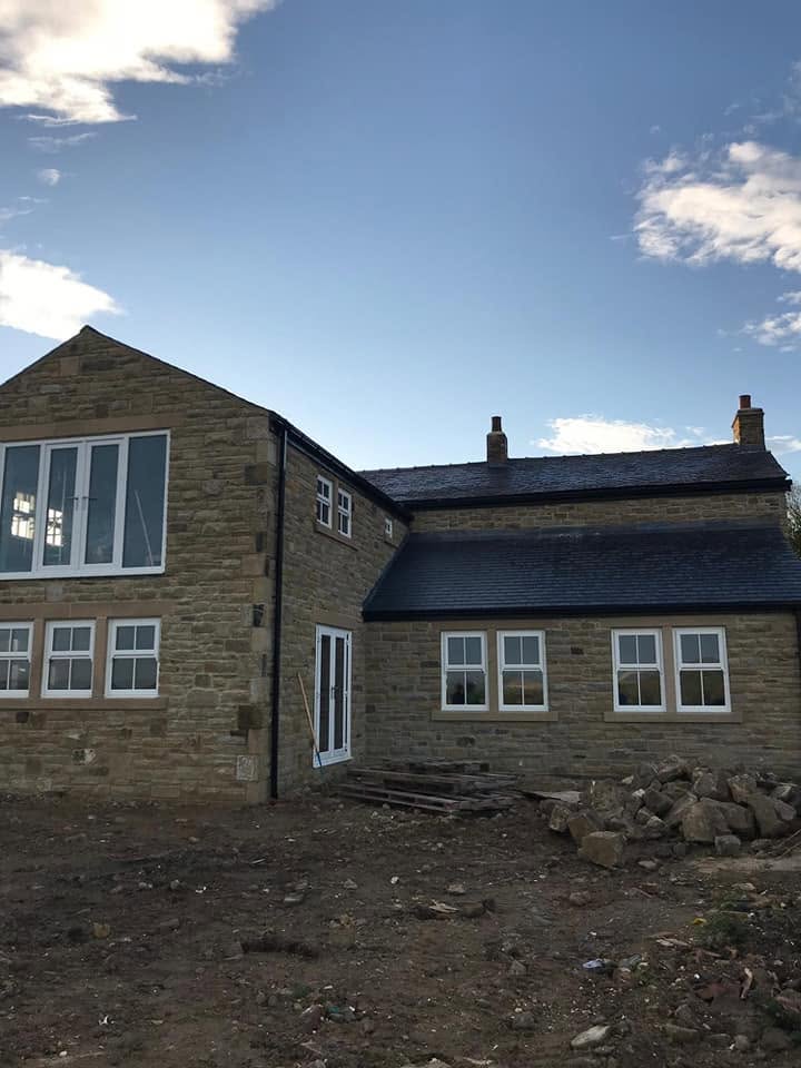 Stone-built extension with slate roof